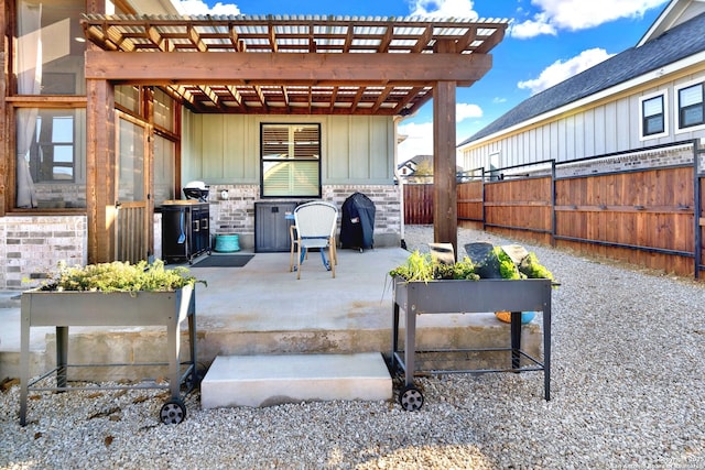 view of patio / terrace featuring a pergola and grilling area