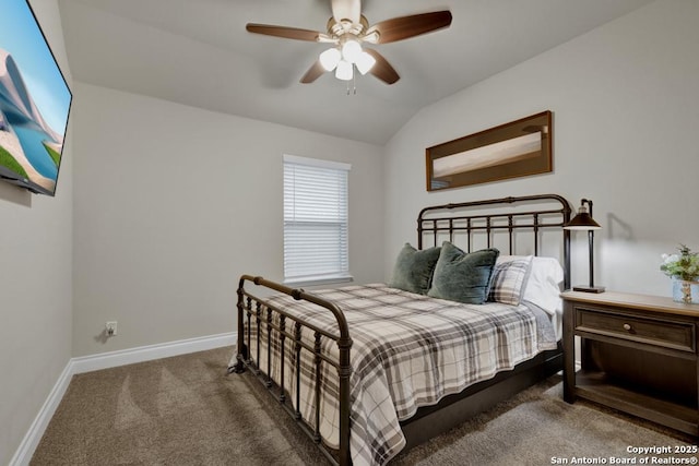 bedroom with lofted ceiling, carpet flooring, and ceiling fan