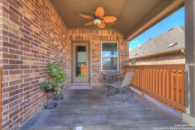 view of patio / terrace featuring ceiling fan