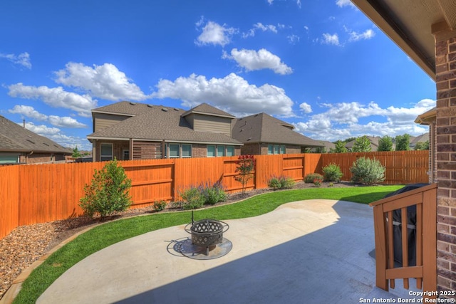 view of patio / terrace featuring a fire pit