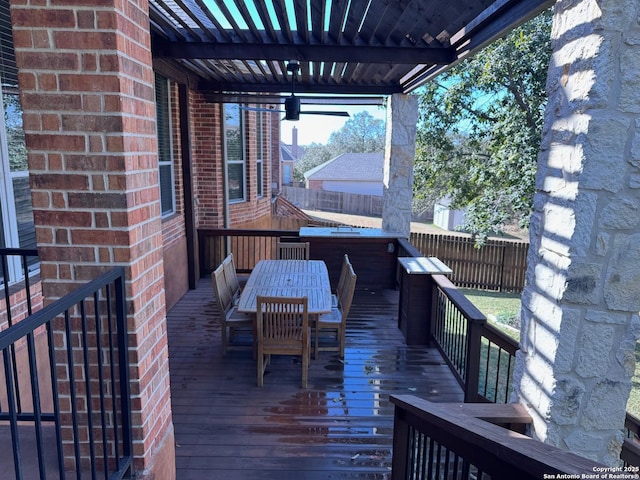 wooden deck featuring a pergola