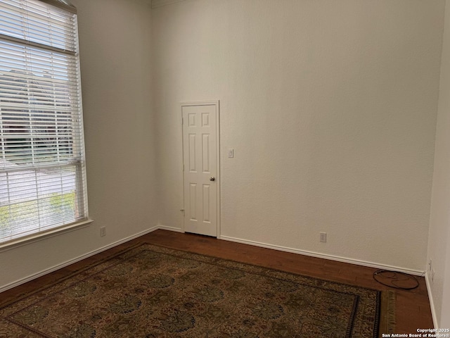 empty room featuring hardwood / wood-style flooring