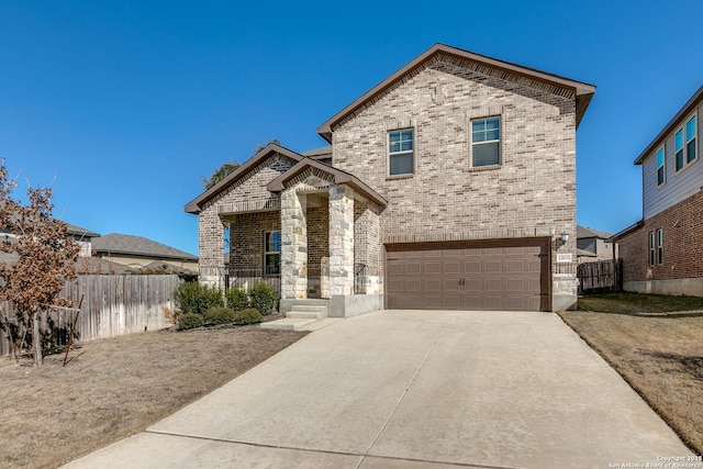 view of front of home with a garage and covered porch