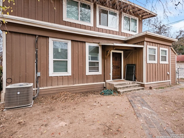 view of front facade featuring cooling unit