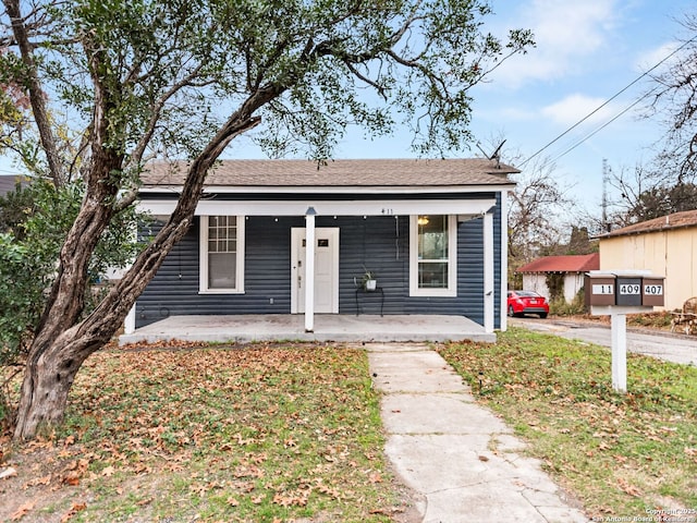 bungalow-style home featuring covered porch