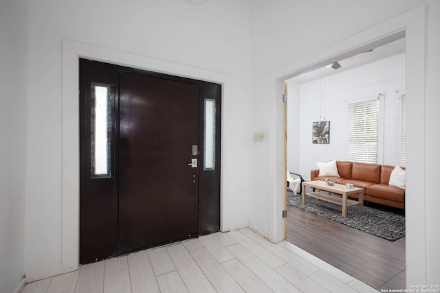 entrance foyer with light wood-type flooring