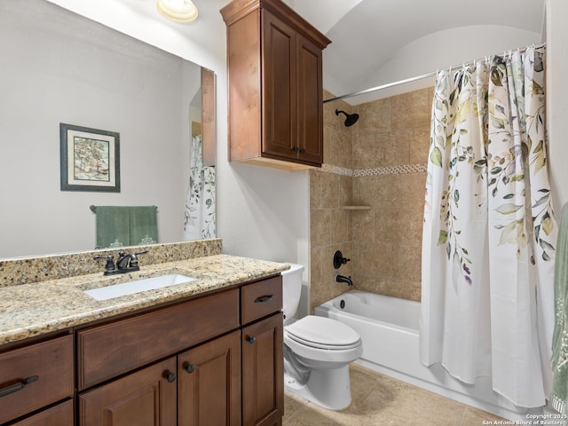 full bathroom with vaulted ceiling, shower / bath combination with curtain, vanity, toilet, and tile patterned floors