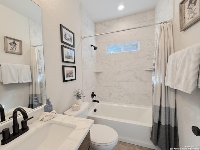 full bathroom featuring shower / bathtub combination with curtain, vanity, and toilet