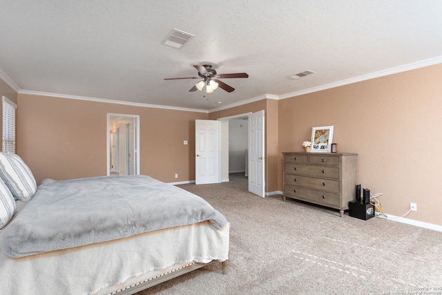 bedroom with crown molding, a textured ceiling, ceiling fan, and carpet