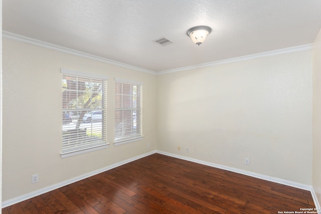 unfurnished room featuring dark hardwood / wood-style flooring, crown molding, and a textured ceiling