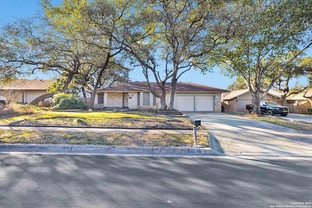 single story home with a garage