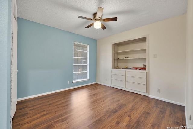 unfurnished bedroom featuring a textured ceiling, dark wood-type flooring, a closet, and ceiling fan