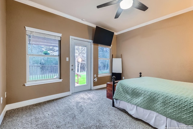 carpeted bedroom with crown molding and ceiling fan