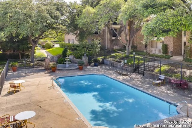 view of pool with a patio area