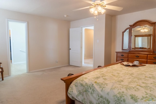 bedroom featuring light colored carpet and ceiling fan