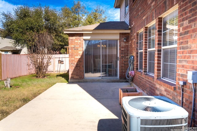 view of patio with cooling unit