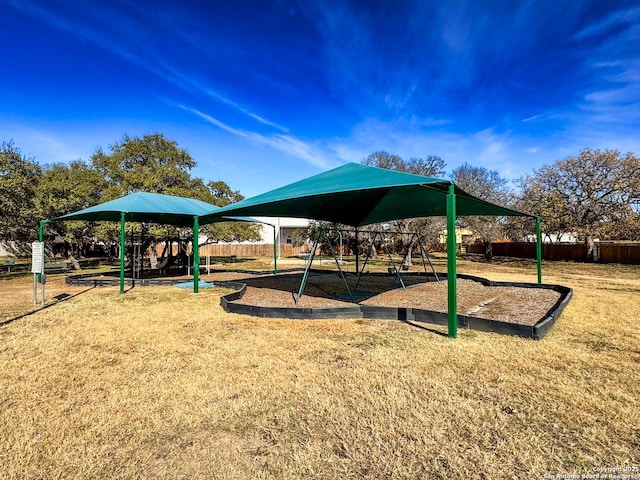 view of jungle gym with a lawn