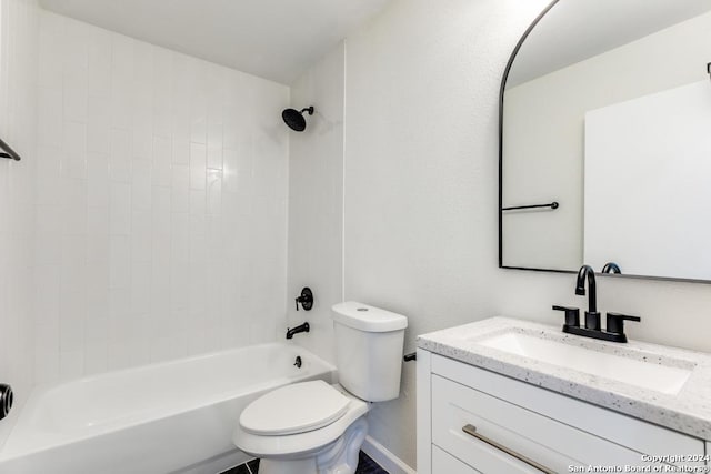 full bathroom with vanity, toilet, and tiled shower / bath