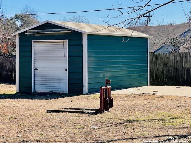 view of outbuilding featuring a garage