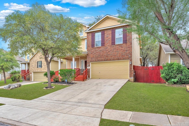 view of front of property with a garage and a front lawn