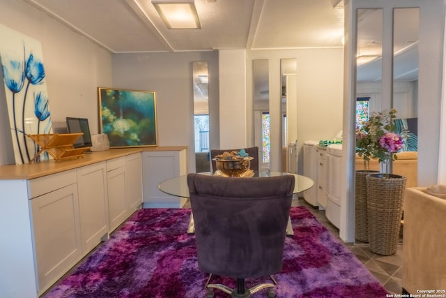 dining area featuring washing machine and dryer