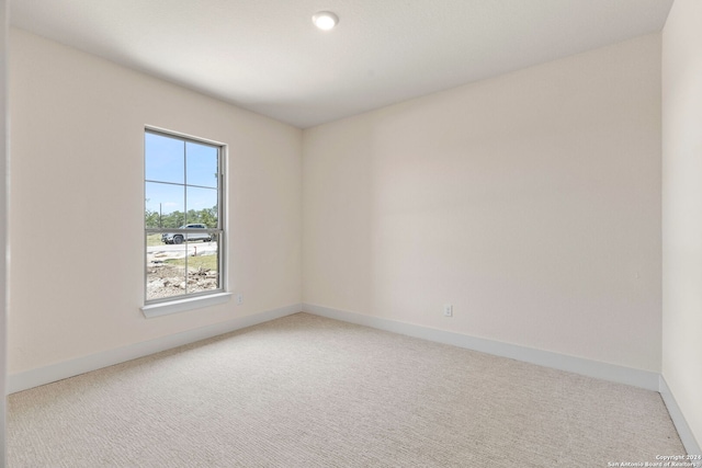 empty room featuring carpet flooring