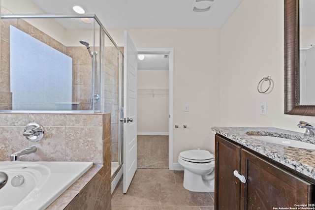 full bathroom featuring vanity, independent shower and bath, and toilet