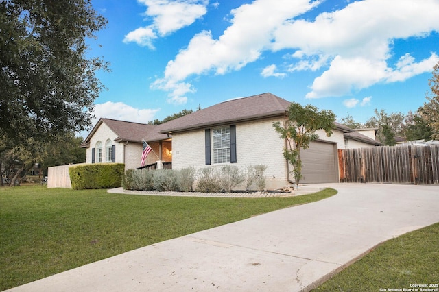 ranch-style house with a garage and a front yard