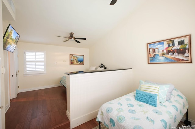 bedroom featuring dark hardwood / wood-style flooring and ceiling fan