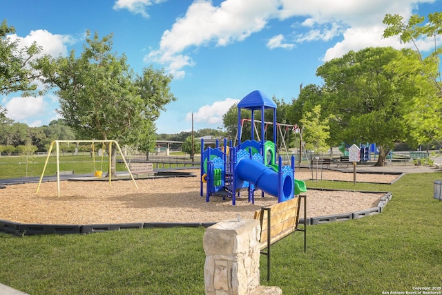 view of jungle gym featuring a yard