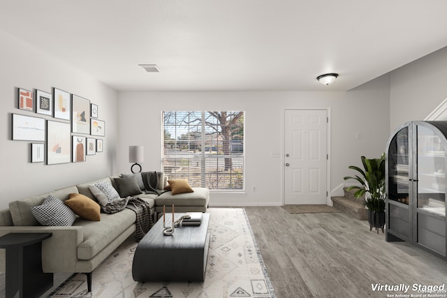 living room featuring light hardwood / wood-style floors