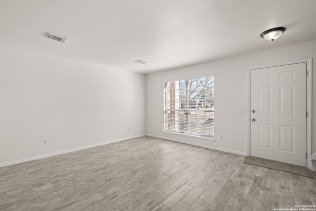 entryway with light hardwood / wood-style flooring