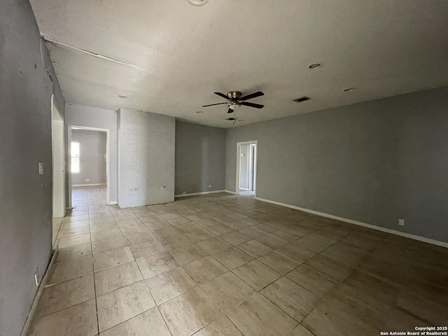 spare room featuring ceiling fan