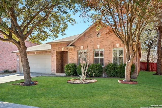 view of front of house featuring a garage and a front yard