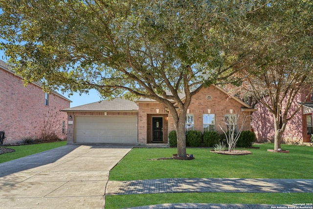 ranch-style home featuring a garage and a front lawn