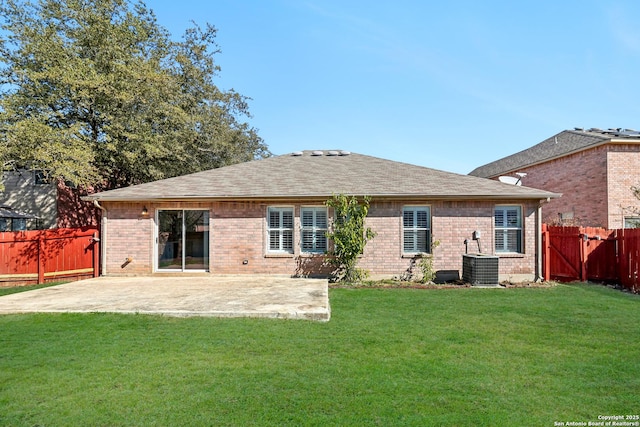 back of property featuring a patio, cooling unit, and a lawn