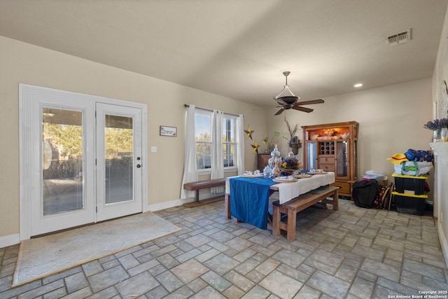 dining room featuring ceiling fan