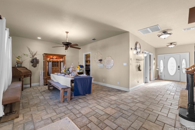 dining area with ceiling fan