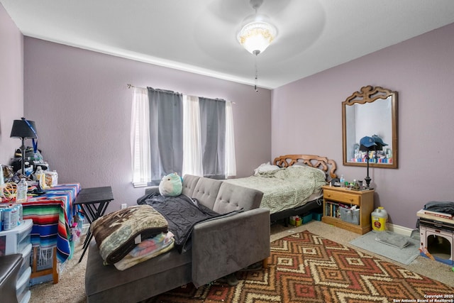 bedroom with carpet floors and ceiling fan