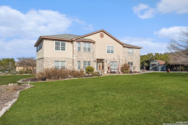 view of front of home featuring a front yard