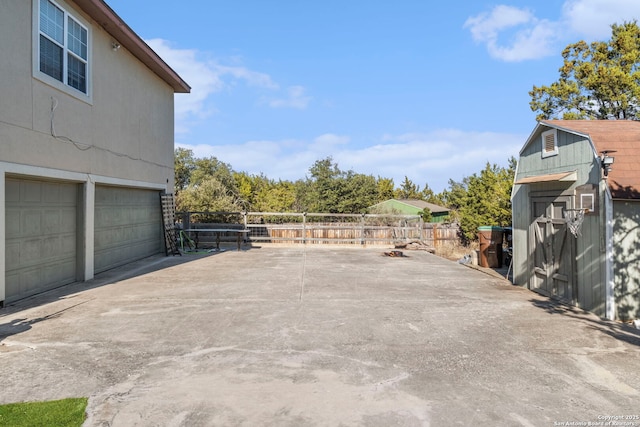 view of patio featuring a garage