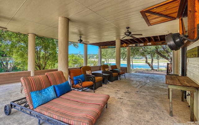 view of patio featuring ceiling fan and an outdoor living space