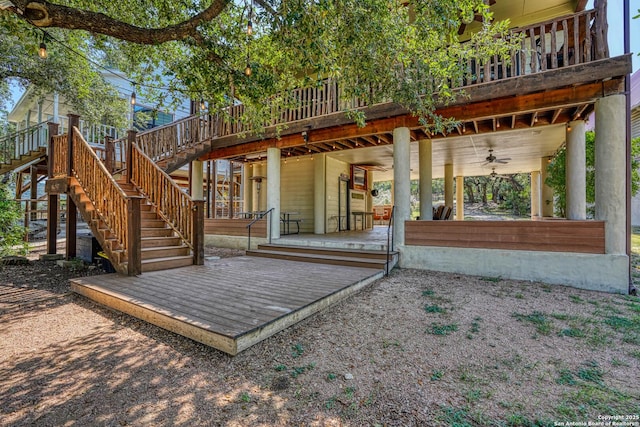 exterior space featuring ceiling fan and a deck