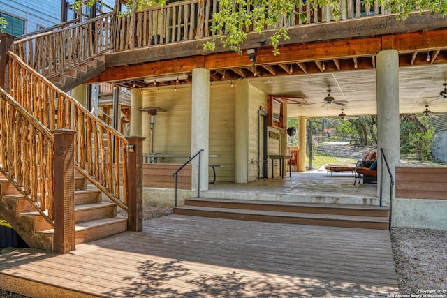 wooden terrace with ceiling fan