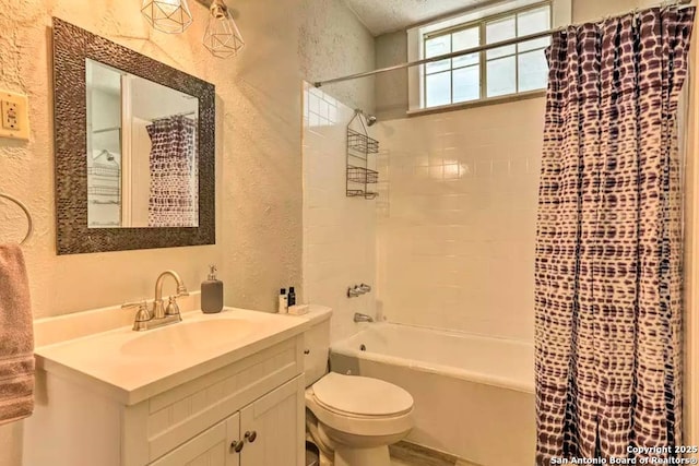 full bathroom featuring shower / bathtub combination with curtain, vanity, and toilet