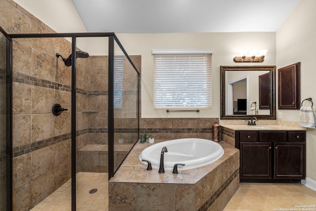 bathroom featuring vanity, tile patterned floors, and independent shower and bath