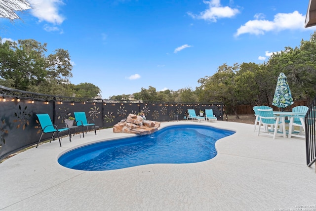 view of pool with a patio