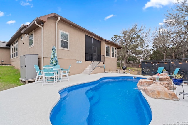 view of pool with a patio area