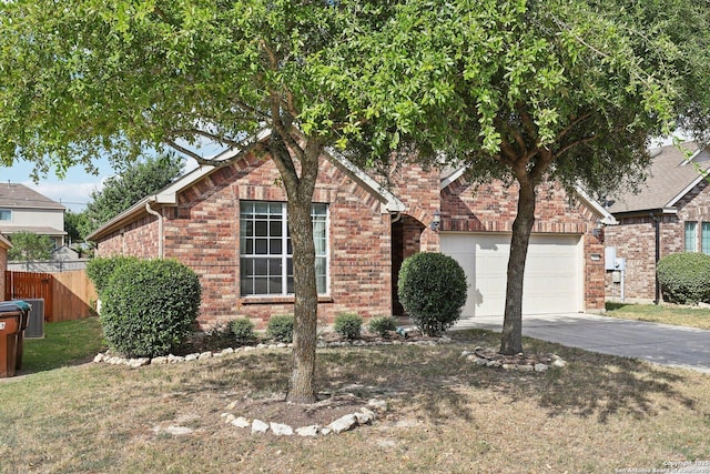 view of front facade featuring central AC unit and a garage