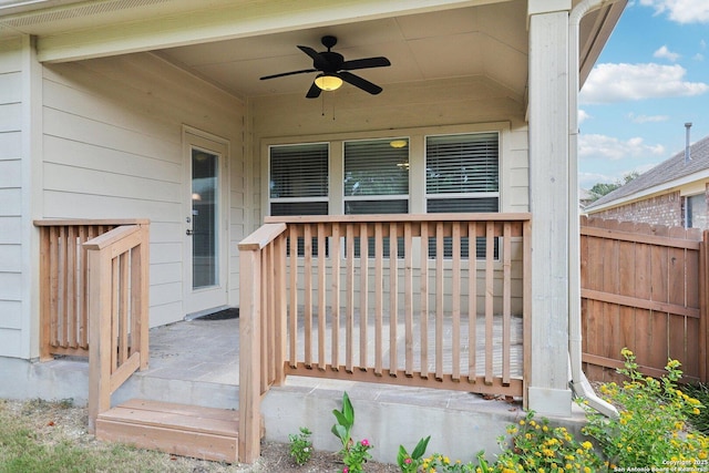 wooden terrace with ceiling fan